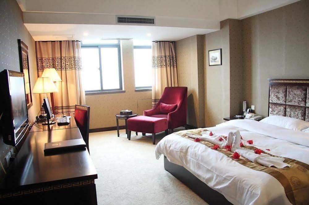 New Beacon Runfeng International Hotel Wuhan Esterno foto